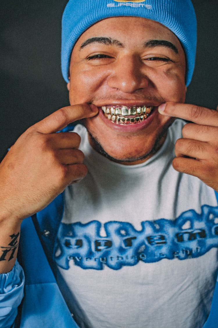 Man Showing Golden Teeth