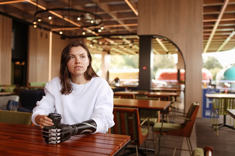 A Woman At A Coffee Shop