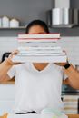 Boy in White Crew Neck T-shirt Holding Books