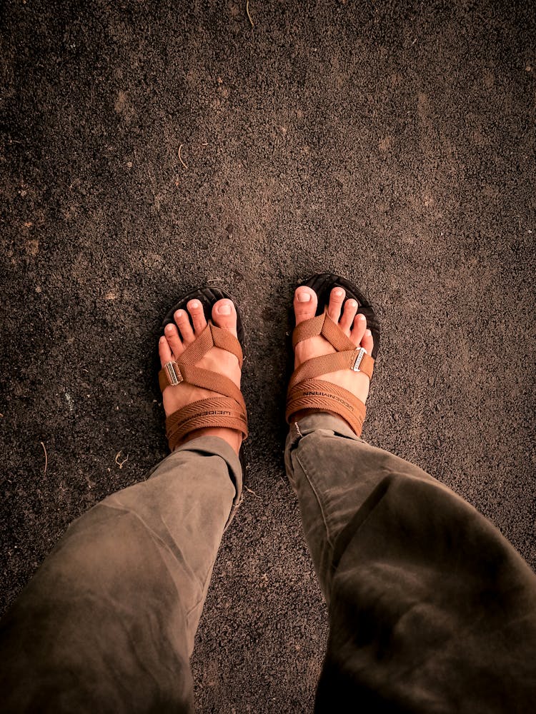 Person Standing On Black Volcanic Ground