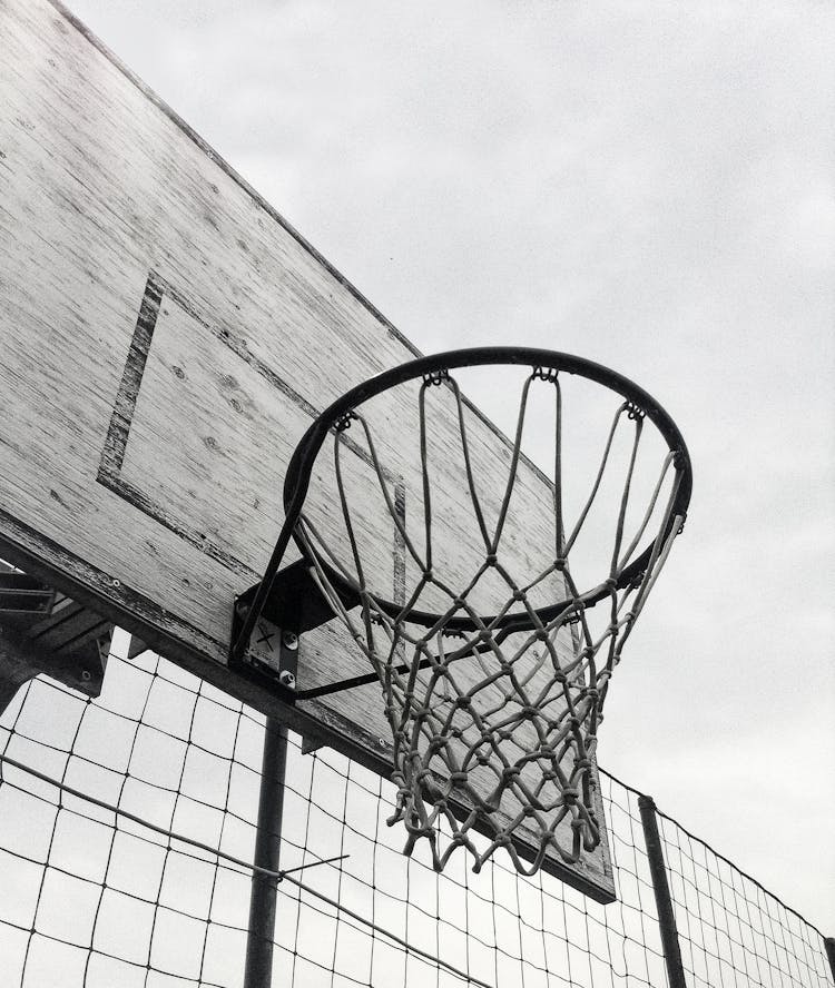 Grayscale Photography Of Basketball Hoop