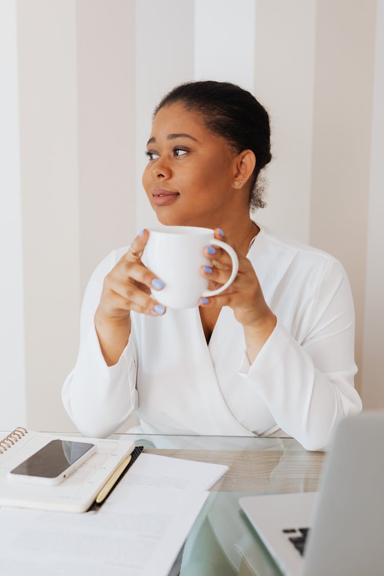 Woman In White Top Holding White Ceramic Mug