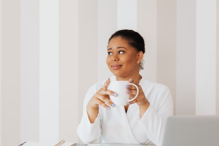 Woman In White Top Holding White Ceramic Mug