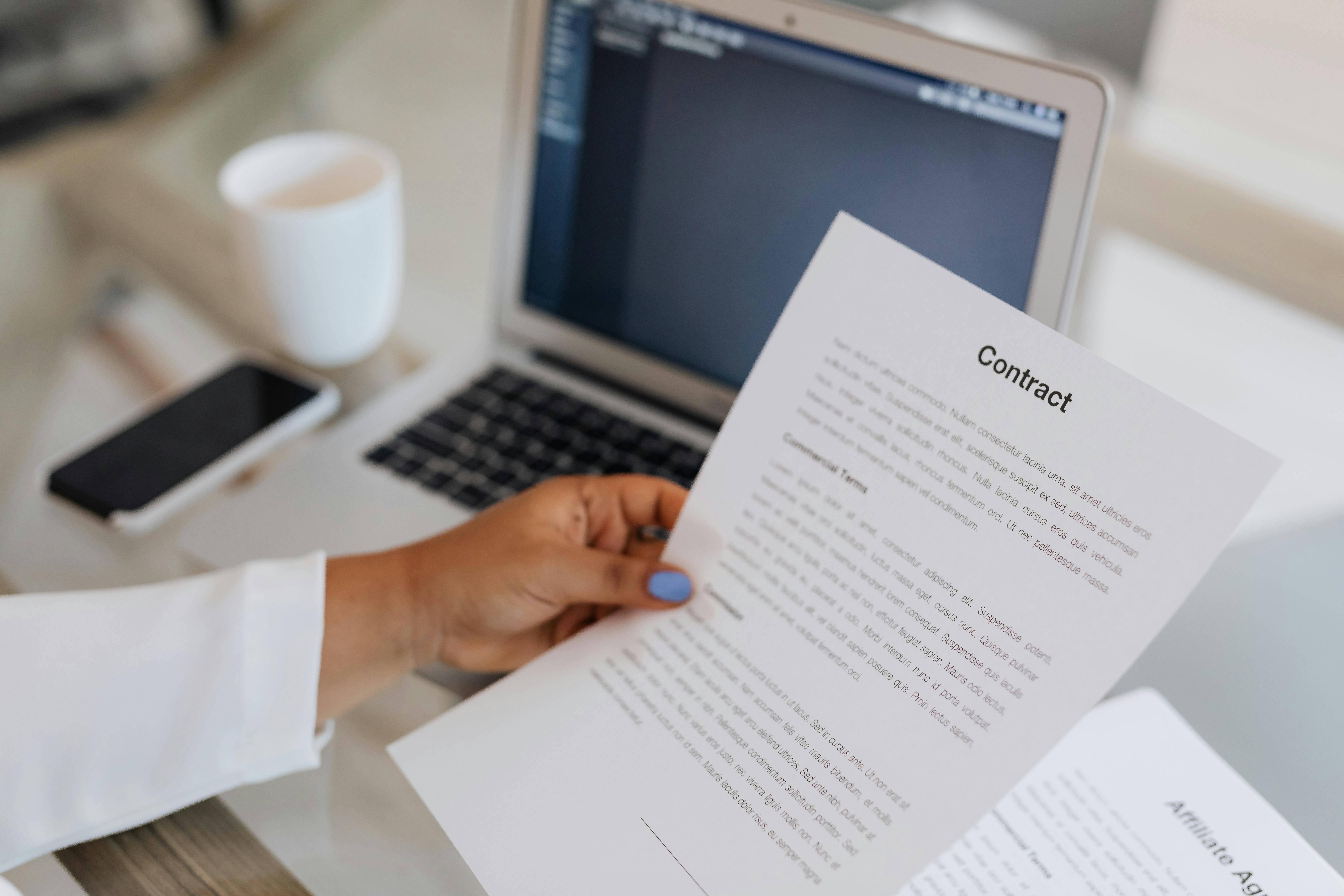 Free Close-Up View of a Person Holding a Paper Stock Photo