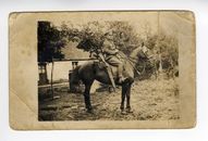 Sepia Photo of Man Riding a Horse