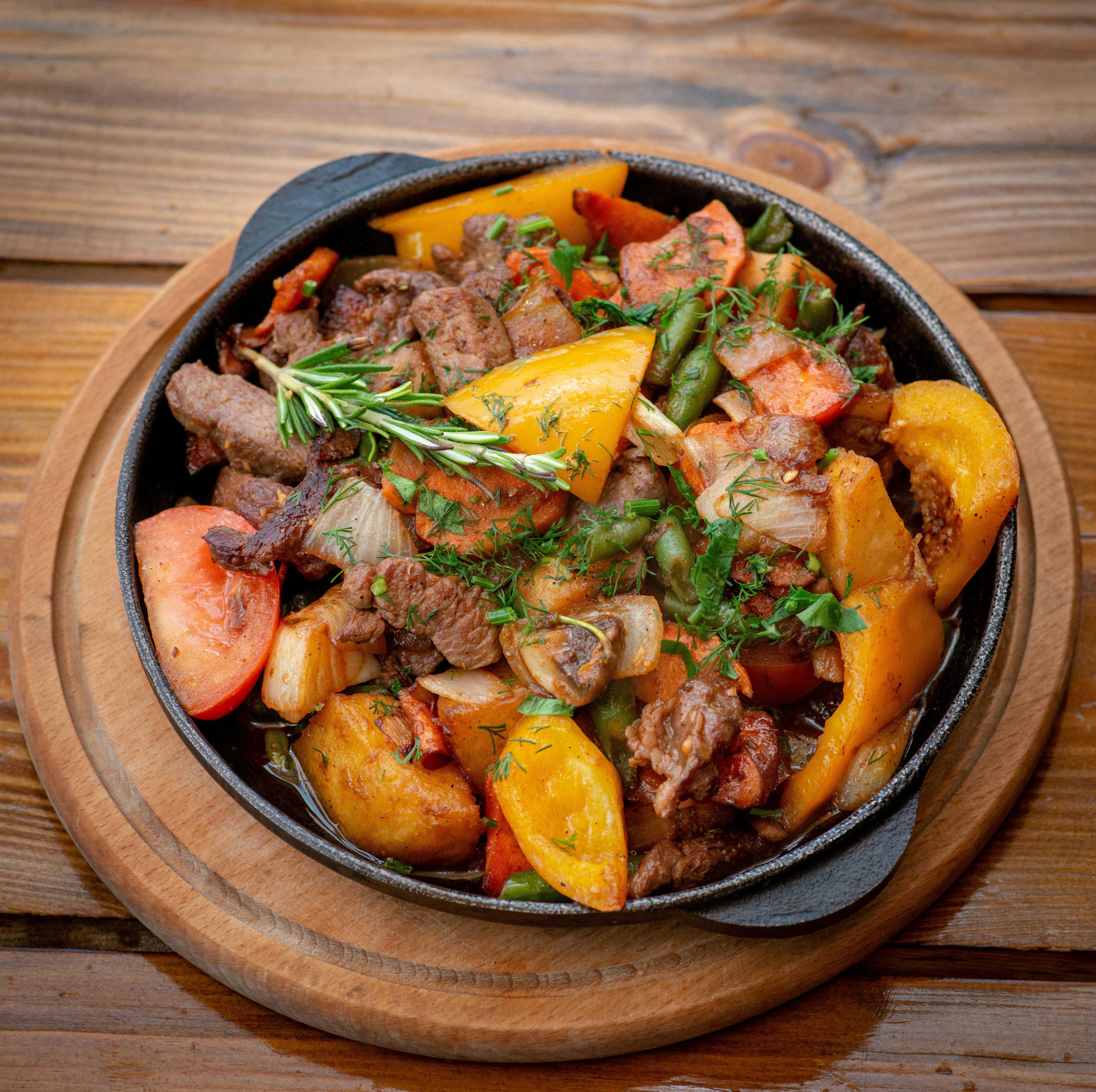 What are the benefits of cooked tomatoes?