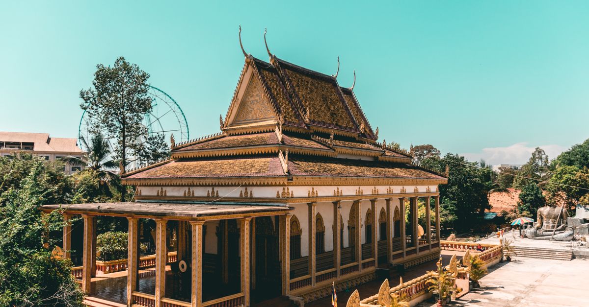 A stunning traditional Cambodian temple under a bright sky in Siem Reap, Cambodia.