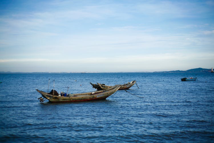 Old Boats On A Sea 