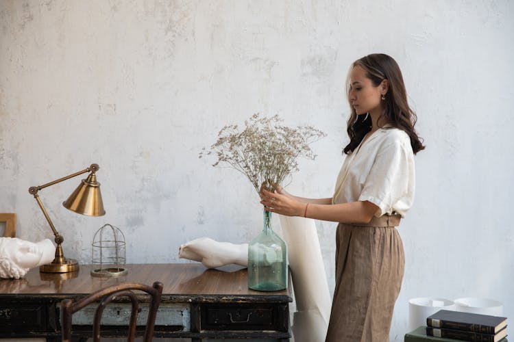 Woman Decorating Office Space