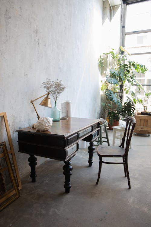 Free Antique Desk and Chair In Rustic Room Stock Photo