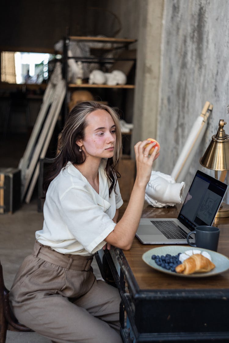 Woman Eating Apple