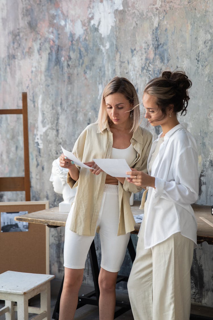 Women In Art Studio Comparing Ideas