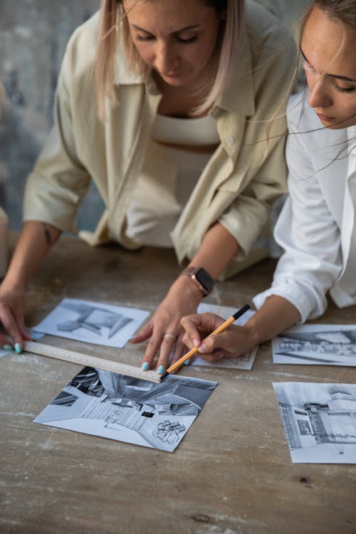 Women Working on Photos