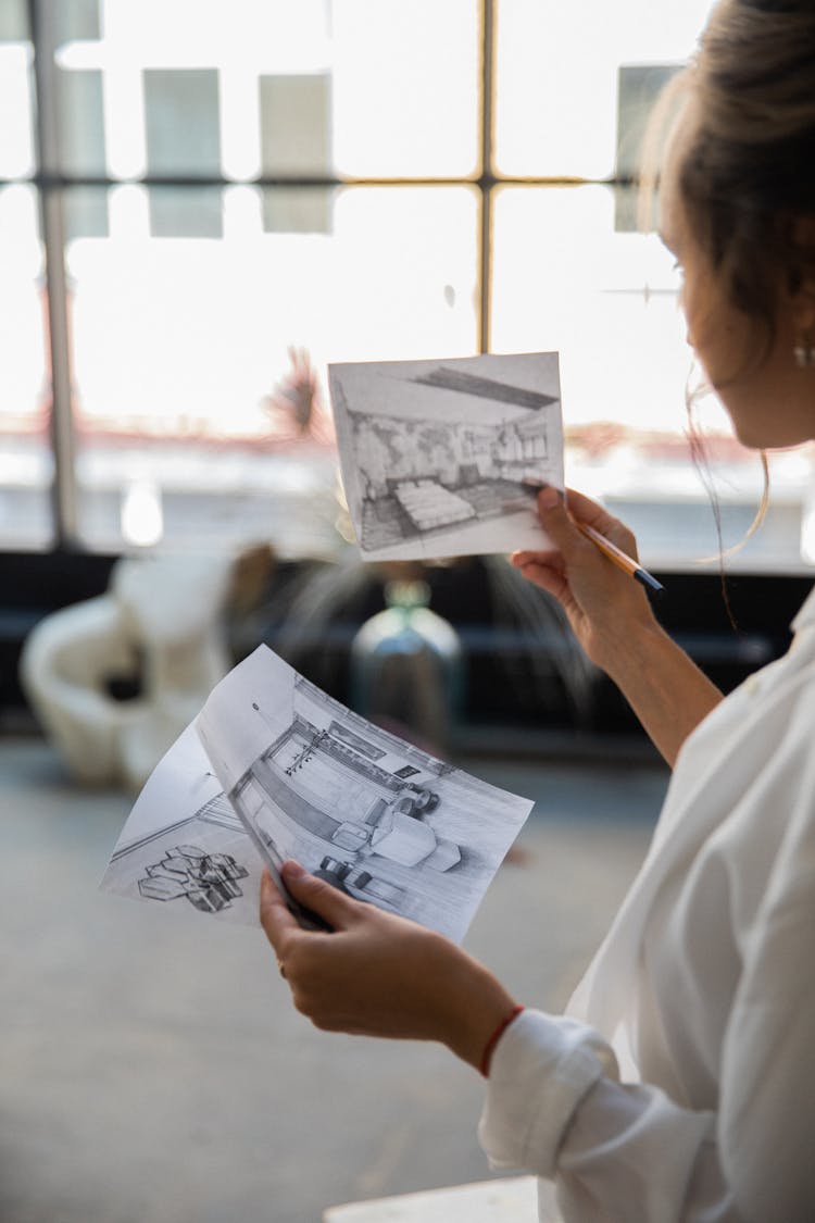 Shot Of Woman Holding Pencil Drawings