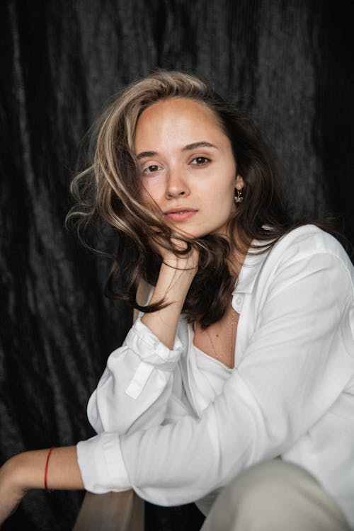 Beautiful Woman in White Long Sleeve Shirt Smiling