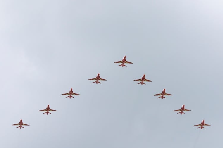 Low Angle Shot Of Airplanes In A V Formation