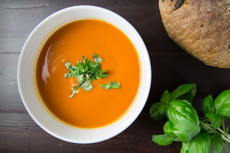 tomato basil soup topped with small grilled cheese cubes