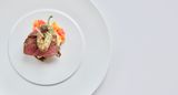 Beef served with roast vegetables — photo by Thomas Svensson on Pexels