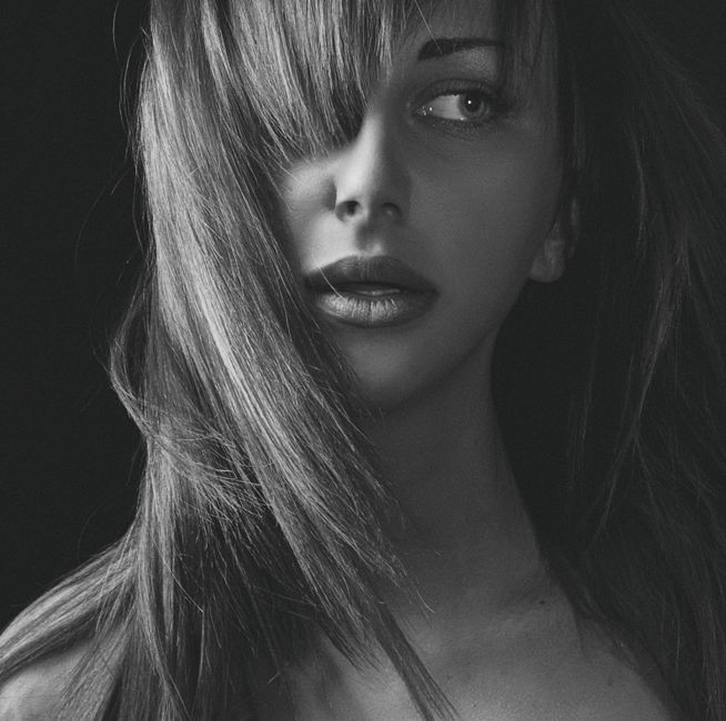 Elegant black and white portrait of a woman in Kyiv, Ukraine.