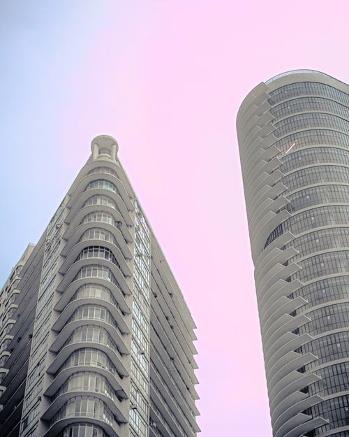Free Modern high-rise buildings against a pastel sky in Belo Horizonte, Brazil. Stock Photo