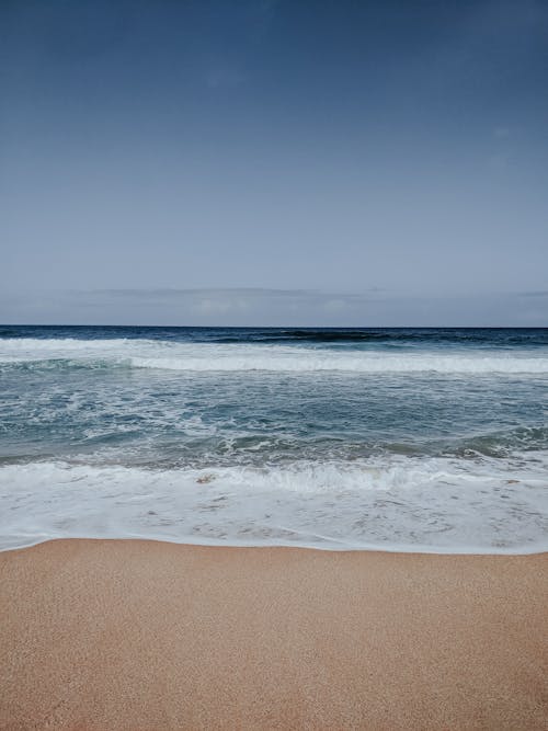 Безкоштовне стокове фото на тему «берег, горизонт, морська піна»