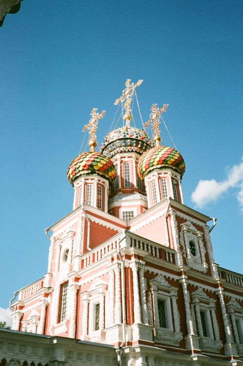 Free From below of exterior of Stroganov Church with ornamental colorful domes in Nizhny Novgorod in sunny day Stock Photo