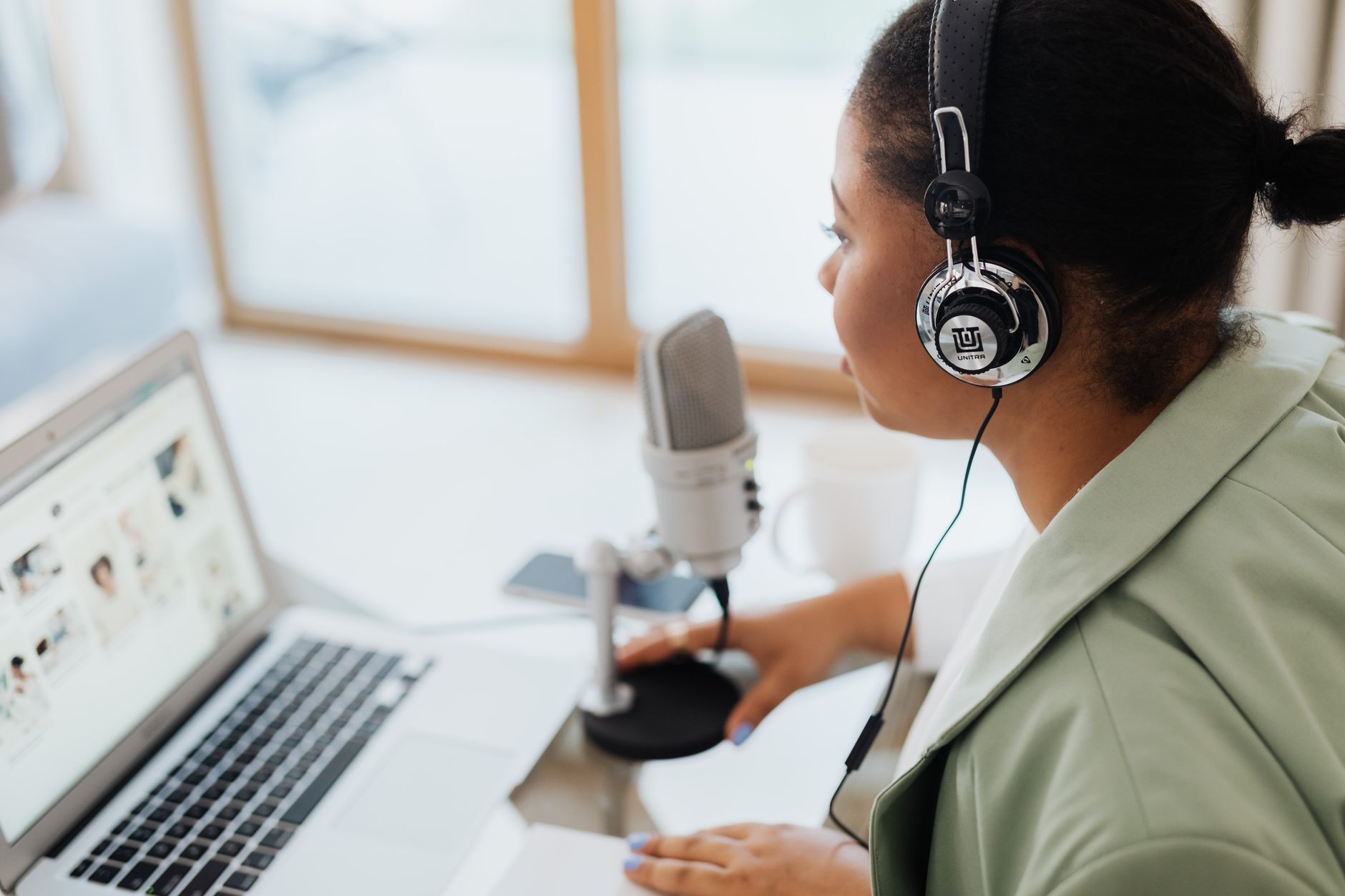 creator workspace with microphone headphones