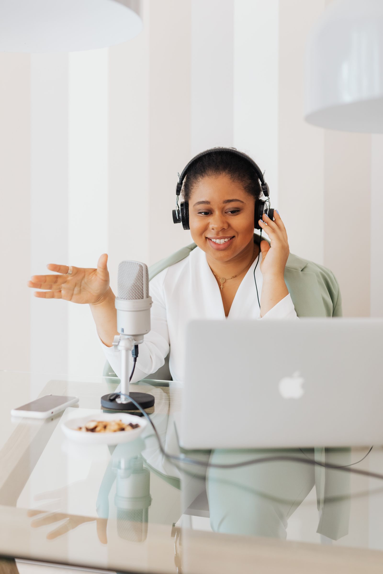 A podcaster recording a conversation