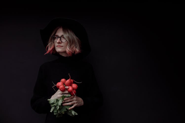 Woman In Black Long Sleeves Holding Garden Radish 