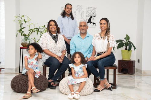 A Family Portrait on a White Wall Background