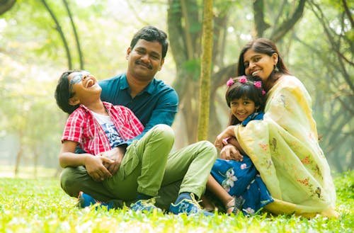 A Family Picture Taken Outdoors