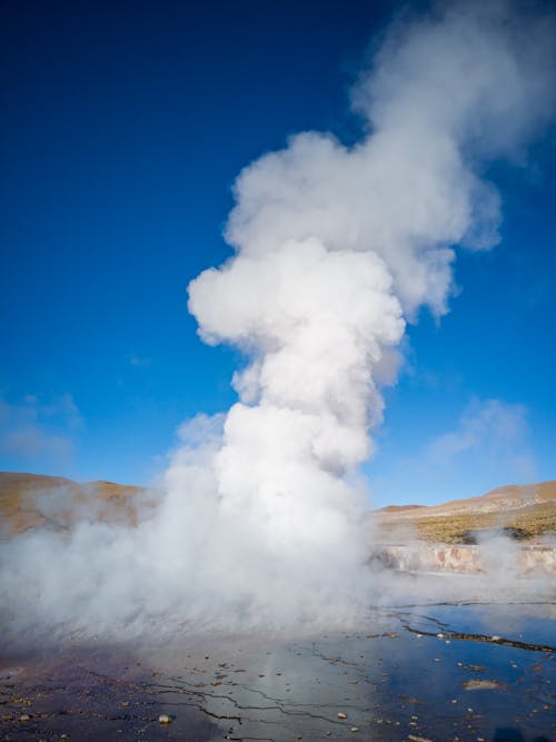 White Smoke Coming Out from Blue Sky