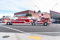 Red and White Fire Truck on Road