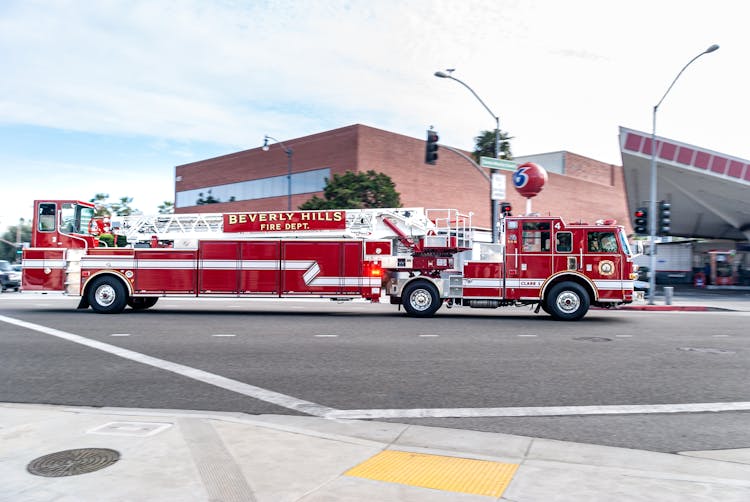 Red And White Fire Truck On Road