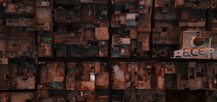 Overhead shot of urban rooftops in Gujranwala, Pakistan, highlighting architecture.