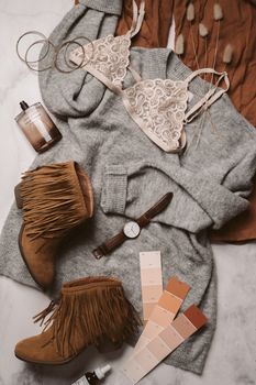 Flat lay of neutral fashion essentials including boots, bra, and color palette for a stylish outfit.. pexels, flat, neutral