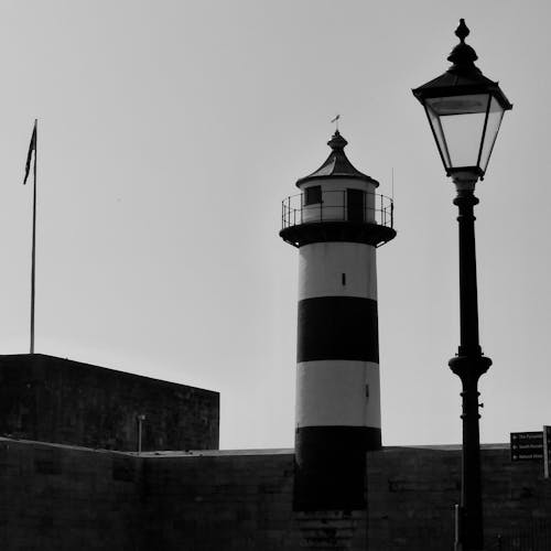 Grayscale Photo of a Lighthouse