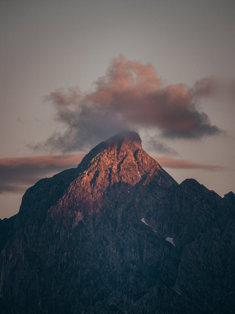 Mountain Peak With Cloud Against Evening Sky