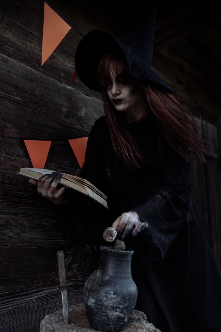 Witch Preparing A Spell