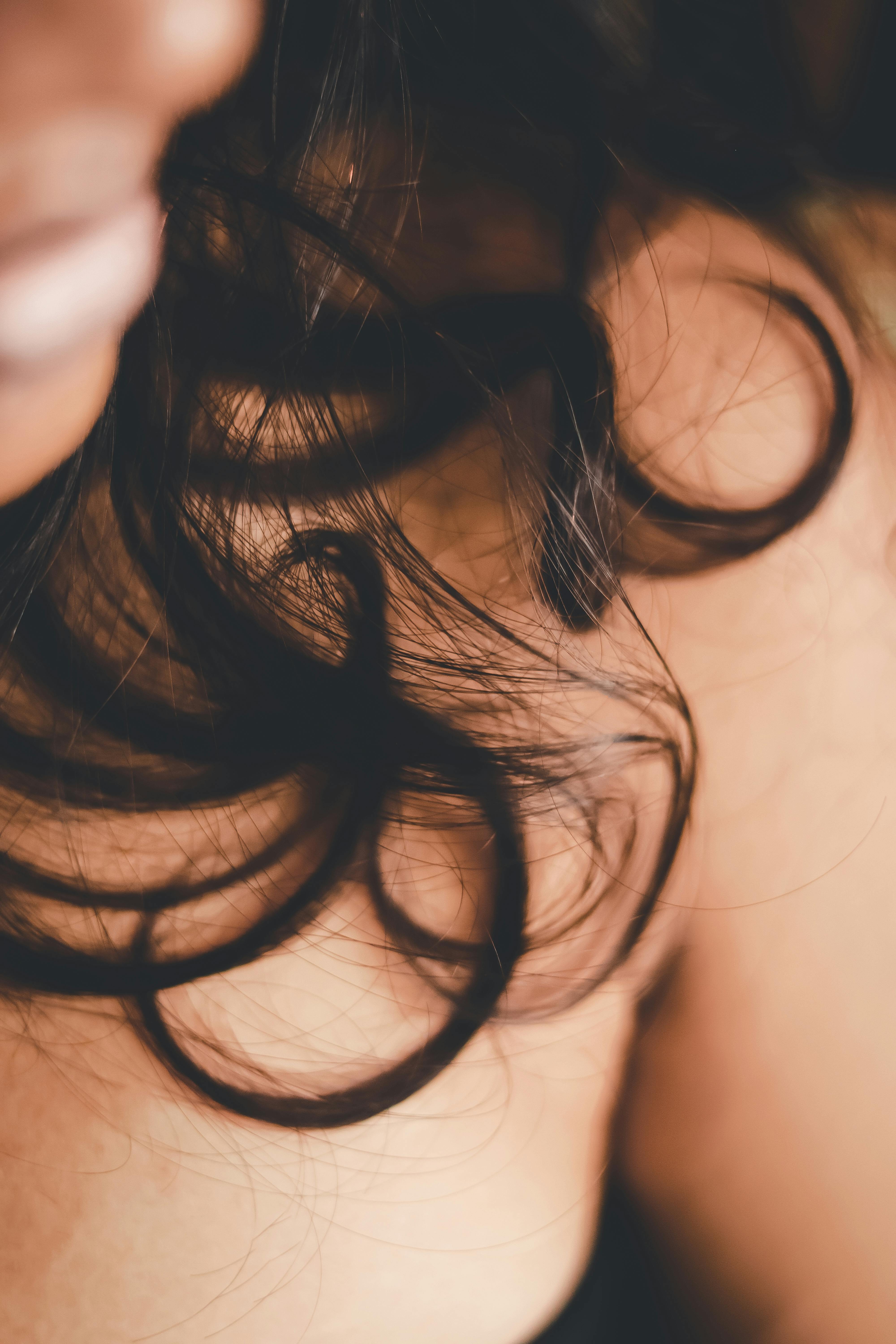 What causes chin hair in females?
