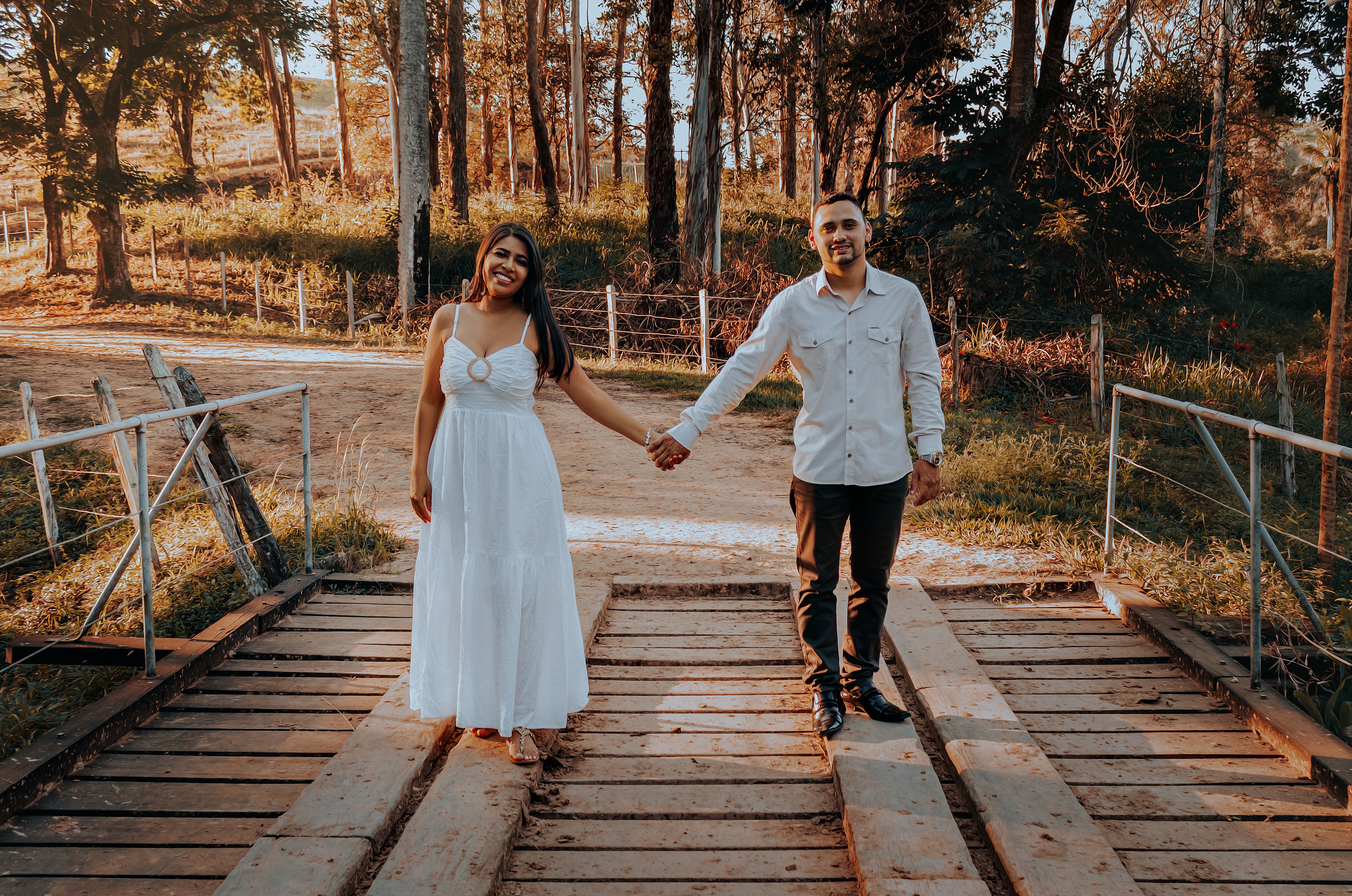 Man and Woman Standing on a Bridge · Free Stock Photo