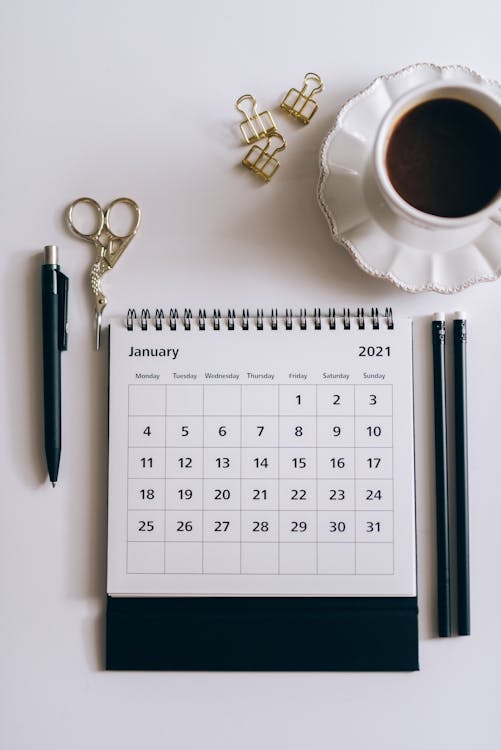 Free Desk Calendar Beside Black Click Pen  Stock Photo