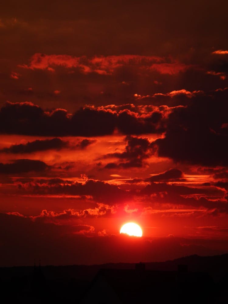 Red Cloudy Sky During Sunset