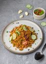 Spicy Noodles with Slices of Citrus on Round Plate