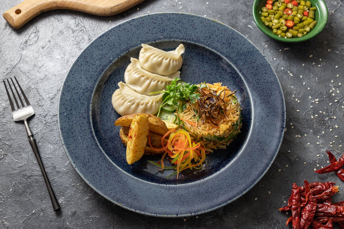 Food Plating of Rice and Dim Sum · Free Stock Photo