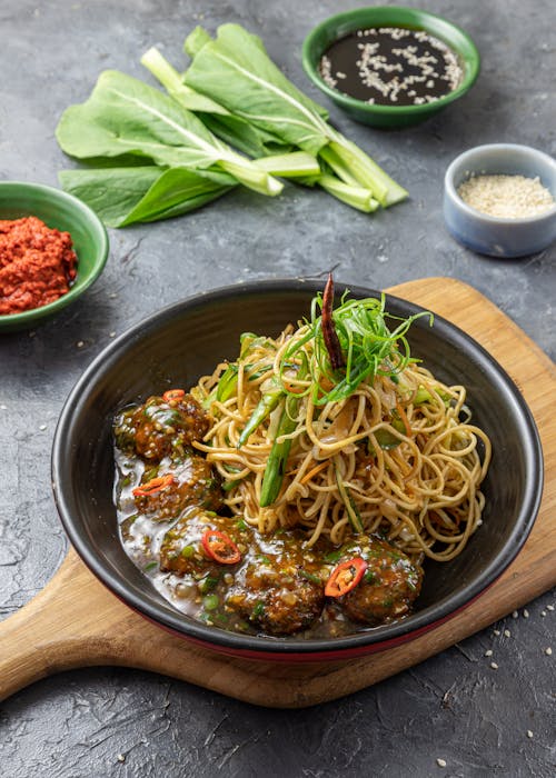 Free A Bowl of Noodles with Meatballs Stock Photo