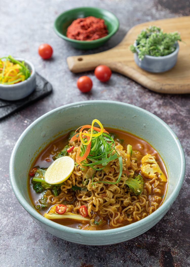 Spicy Noodle Soup In A Ceramic Bowl