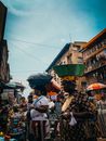 Women Carrying Basins on their Heads in the Market