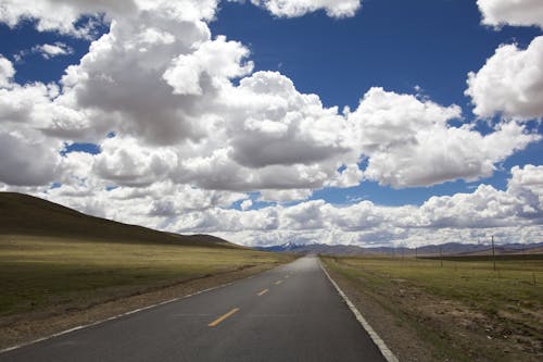 Free Road Under White Clouds Stock Photo