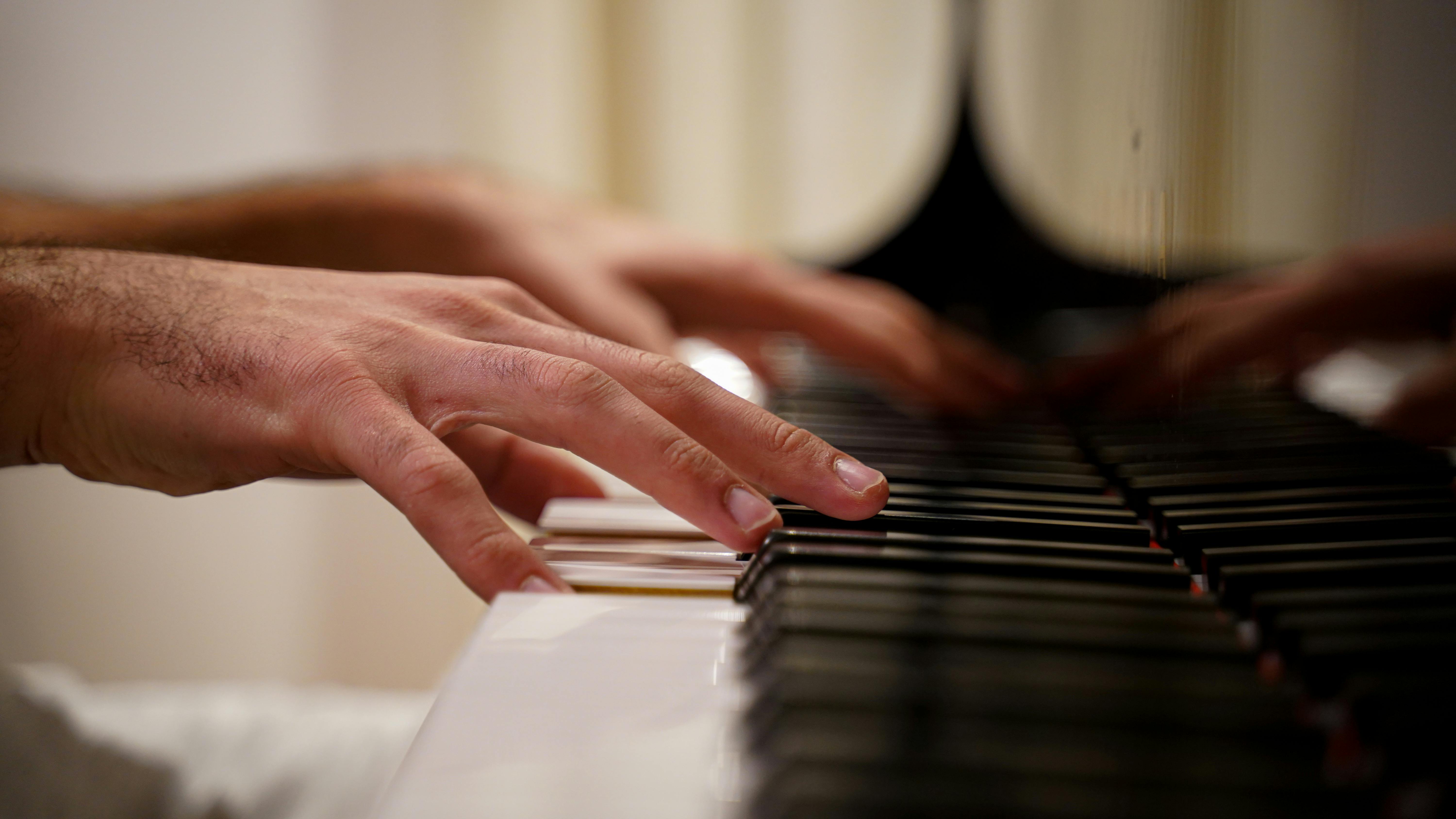 hand on piano keys